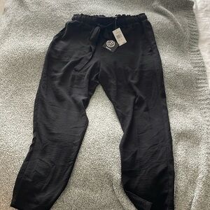 Soft black satin type pant never worn size medium